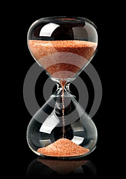 Hourglass with red sand showing the passage of time