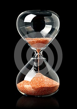 Hourglass with red sand showing the passage of time