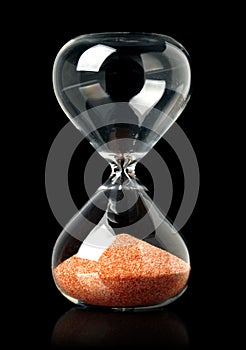 Hourglass with red sand showing the passage of time