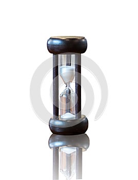 Hourglass or Sand Clock as Time Passing Concept for Business Deadline, Urgency and Running Out of Time. Black Wooden Sand Clock wi