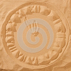 Hourglass on a sand dune beach. concept passage time