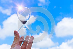 Hourglass Sand Timer Clock time blue sky cloud background