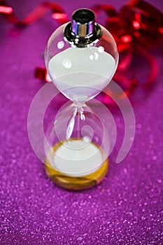 Hourglass, symbolic, time is running out, New Year`s Eve