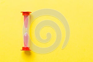 hourglass on the table, sand clock as time passing concept for business deadline, copy space