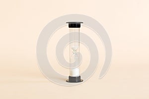 hourglass on the table, sand clock as time passing concept for business deadline, copy space