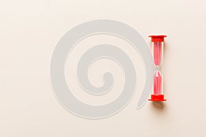 hourglass on the table, sand clock as time passing concept for business deadline, copy space