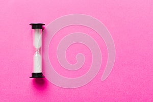 hourglass on the table, sand clock as time passing concept for business deadline, copy space