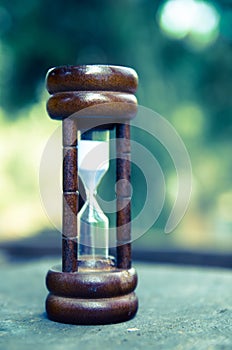 Hourglass time passing concept for business deadline, urgency and running out of time