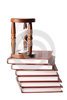 Hourglasses and book isolated