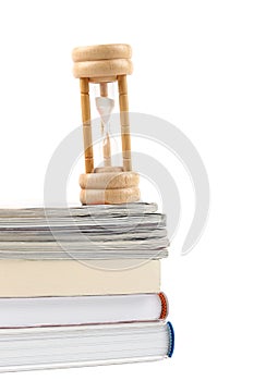 Hourglasses and book isolated