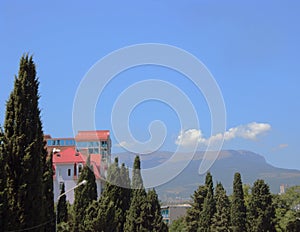 House against mountains