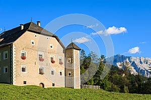 House in alpine landscape of Dolomites Mountains, Italy