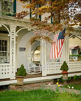House with American flag on Main Street, Nelsonville, New York