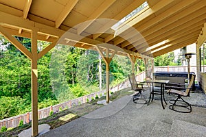 House backyard with jacuzzi and patio area