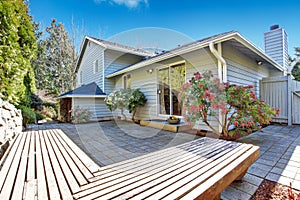 House backyard with wooden deck
