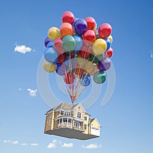 House with balloons bunch flying in the sky. Real estate purchasing, moving house and housewarming concept photo