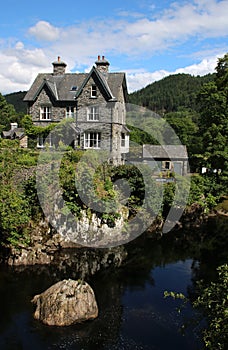 House on banks Afon river Llugwy, Betws-y-Coed