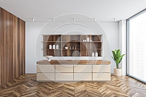 House bar counter in wooden and white room with parquet and big window