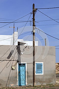 House behind electricity pole in Cape Verde