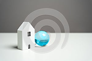 House and blue globe. Internet access concept.