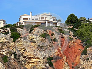 House on bluff photo