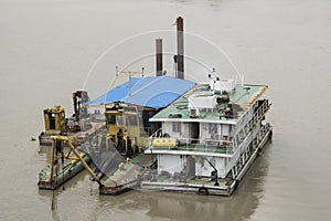 House board on the river, Industrial machine on the river, Sand mining ship in the river