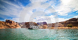 House boat floating in a cove in Lake Powell