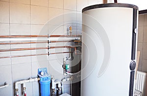 House boiler room with copper pipeline and water filtration system