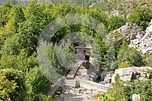 House and bridge to popular tourist attraction in Valbona valley, Albania, a Mulliri i Vjeter old mill house