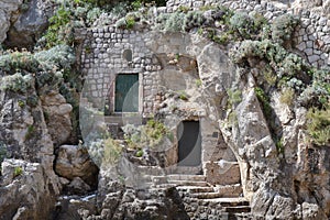 House build into rock