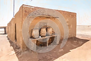 House built of mud bricks in the desert with a bench on which dr photo