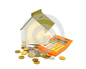 House, calculator and coins