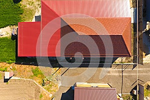 A house with a canopy over the courtyard. Roof from corrugated metal profile.