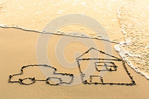 House and a Car drawing on the beach sand