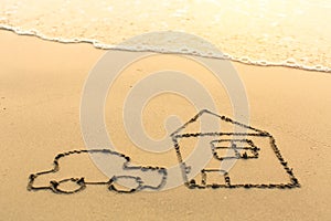 House and a car drawn on the sea beach. Travel.