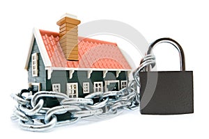 House in chains locked with padlock