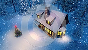 House and christmas tree at snowfall night top view