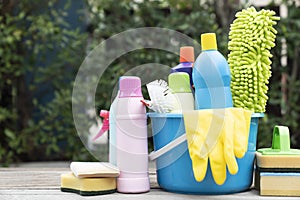 House cleaning plastic product on wood table background, home service or housekeeping concept