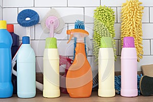 House cleaning plastic product on wood table background, home service or housekeeping conceptc