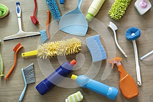 House cleaning plastic product on wood table with home service or housekeeping concept