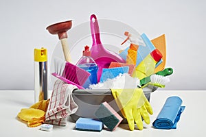 House cleaning products pile on white background