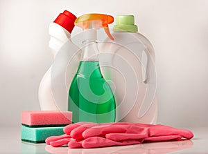 House cleaning products and tools on white background.