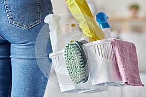 House, cleaning products and woman hands holding plastic container with cleaner tools. Home, cleaning service and