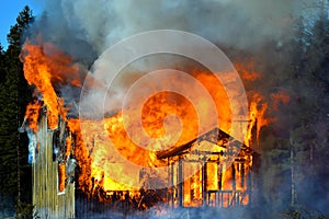 House completely engulfed in flames photo