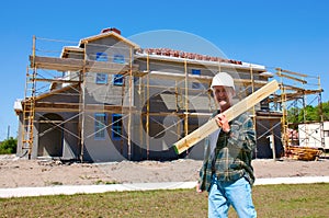 House construction with a contractor at work