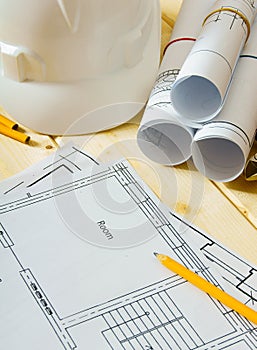 House construction. Drawings for building, helmet