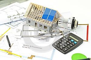 House with a construction plan and solar panel planning