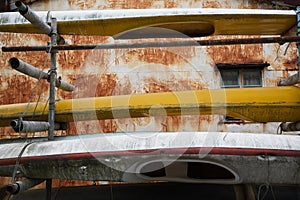 House with corrosion and the old canoes