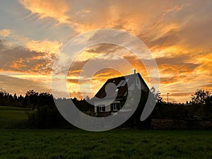 house in the countryside near a forest in switzerland