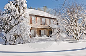 House covered in winter snow